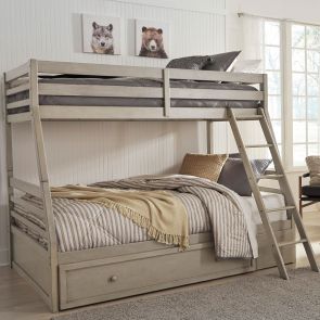 Front view of Lettner Twin/Full bunk bed with storage in home
