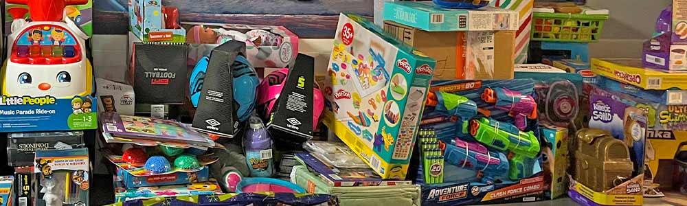 Generous donations from Bernie & Phyl's, their employees and customers deliver toys and gift cards to those who need it most at the Home for Little Wanderers. Bundles of toys